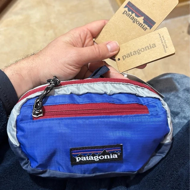 Cangurera Banano Patagonia de 1 lt material nylon RipStop reciclado Ajustable Unisex Negra, Gris y Azul